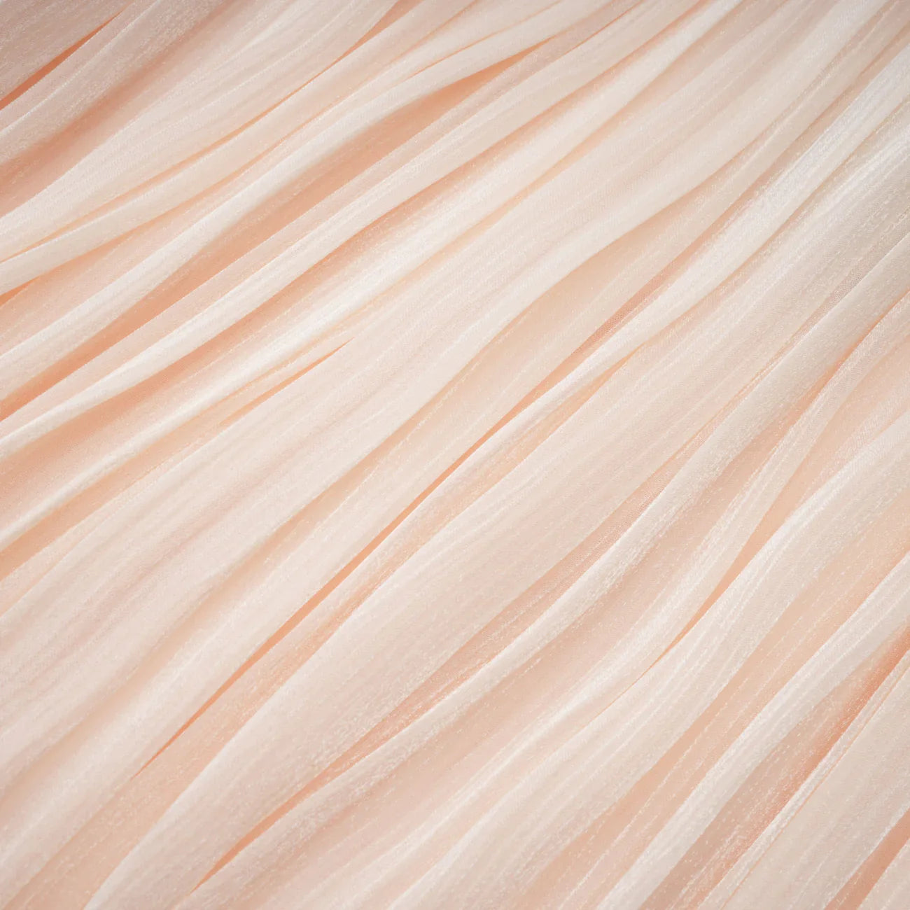Minivestido plisado con volantes en tonos neutros de Halvard