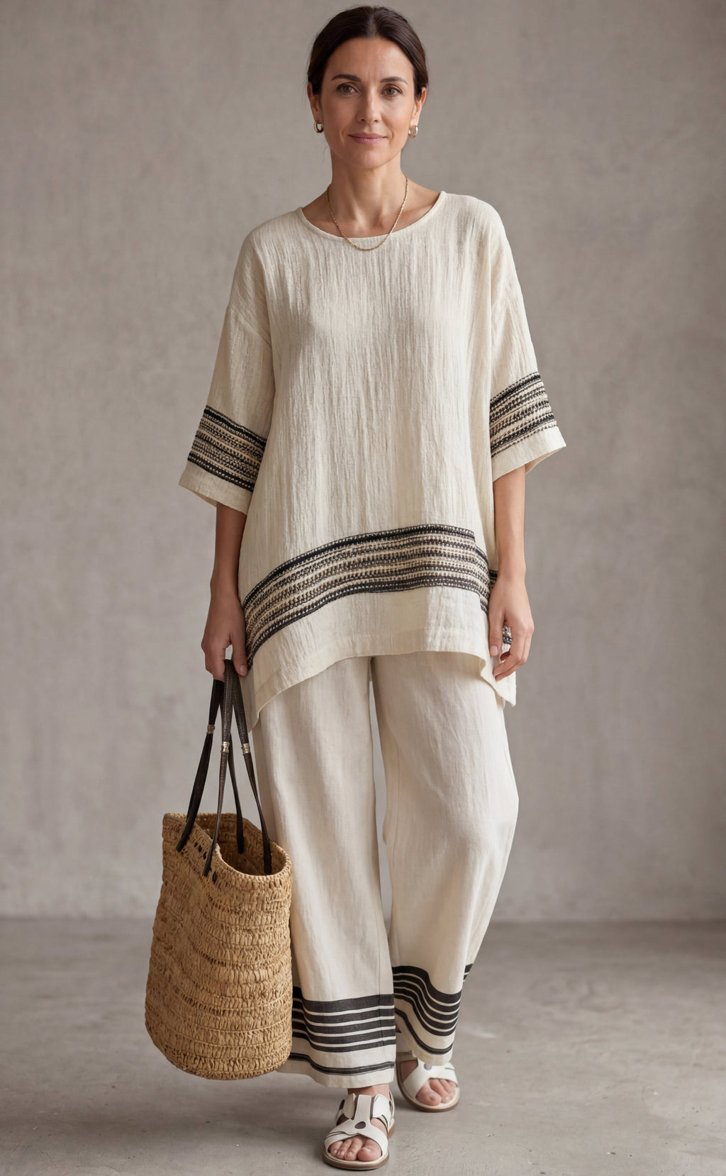 Mariella • Top elegante de lino con rayas negras y pantalones fluidos