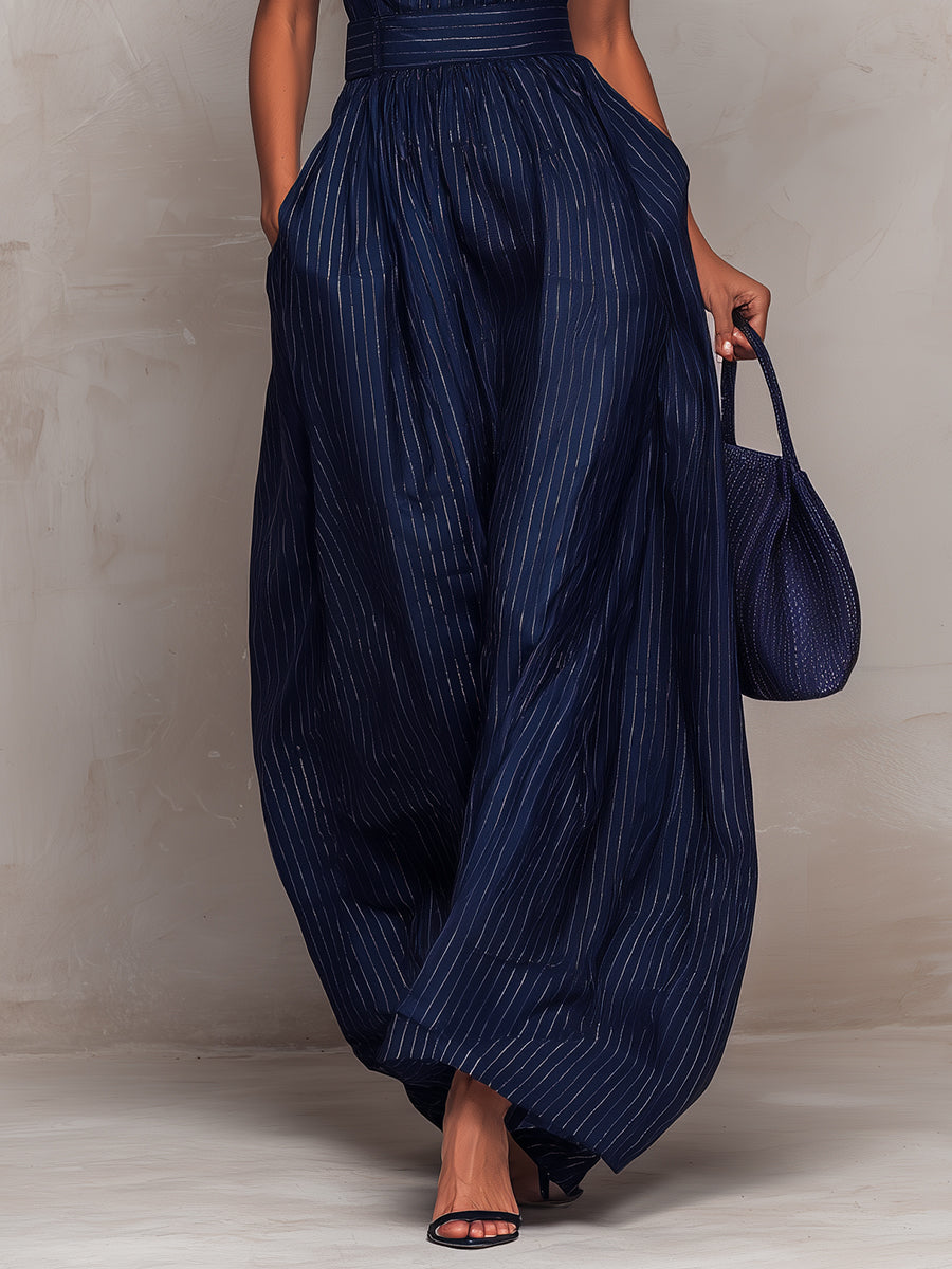 Anna • Mono de rayas azul marino con escote ojal y pantalón ancho